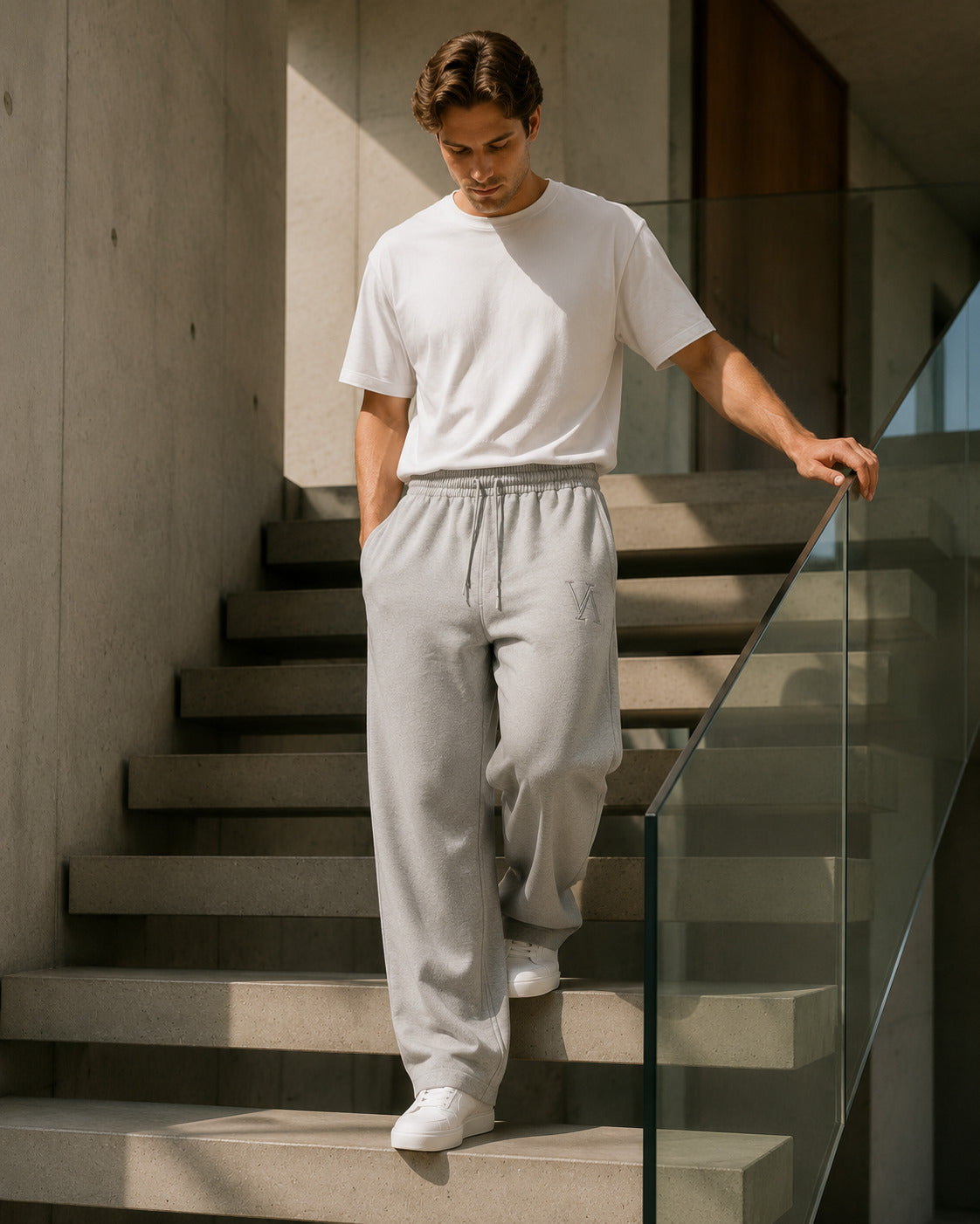 VAELO Foundation Sweatpant in Heather Grey — side movement view on stairs