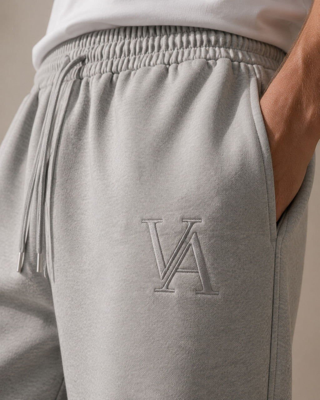 VAELO Foundation Sweatpant in Heather Grey — waistband, drawcord and VA embroidery detail